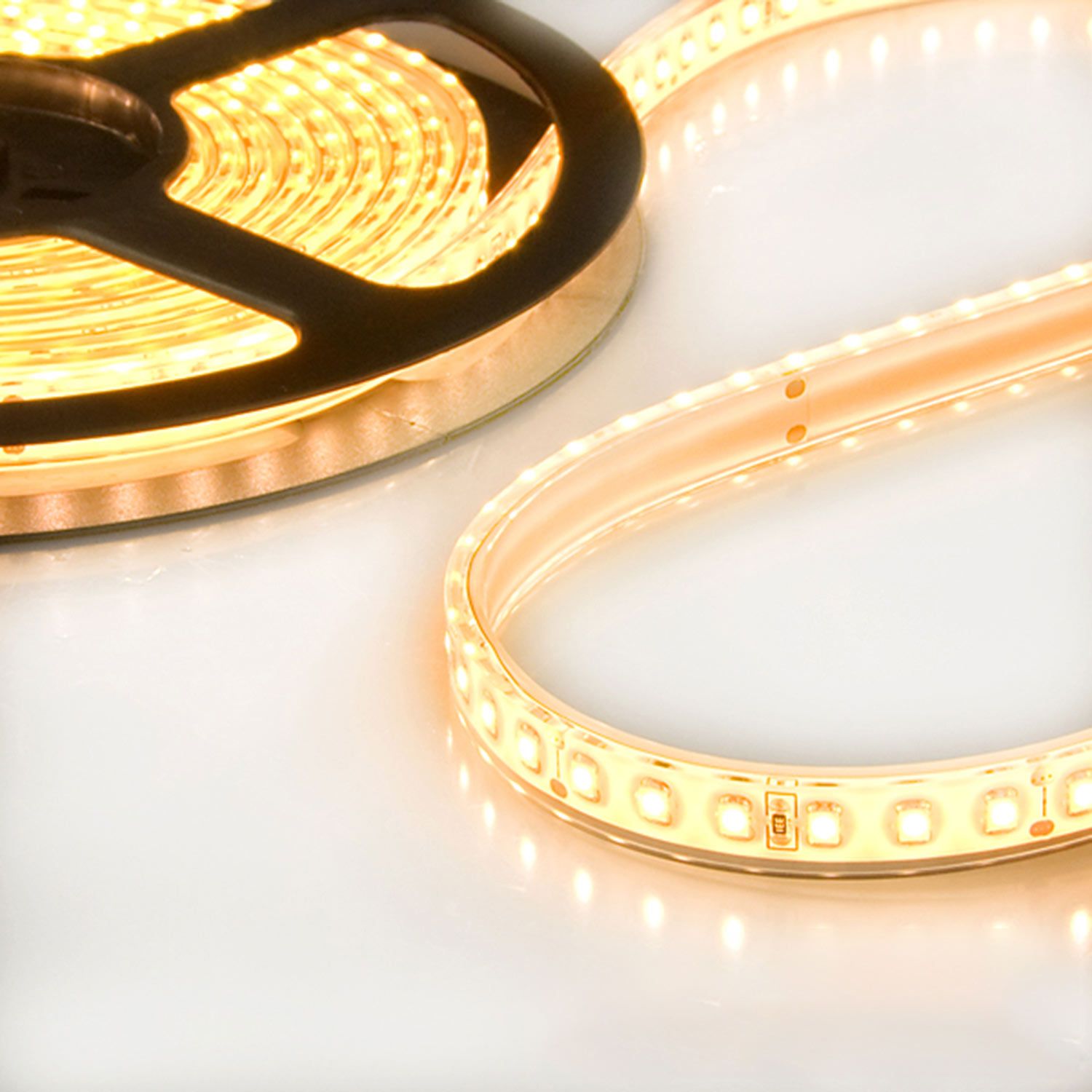 ISOLED LED AQUA827 Flexband, 24V DC, 10W, IP68, 2700K, 5m Rolle, 120 LED/m ISOLED LED AQUA827 Flexband, 24V DC, 10W, IP68, 2700K, 5m Rolle, 120 LED/m - 1