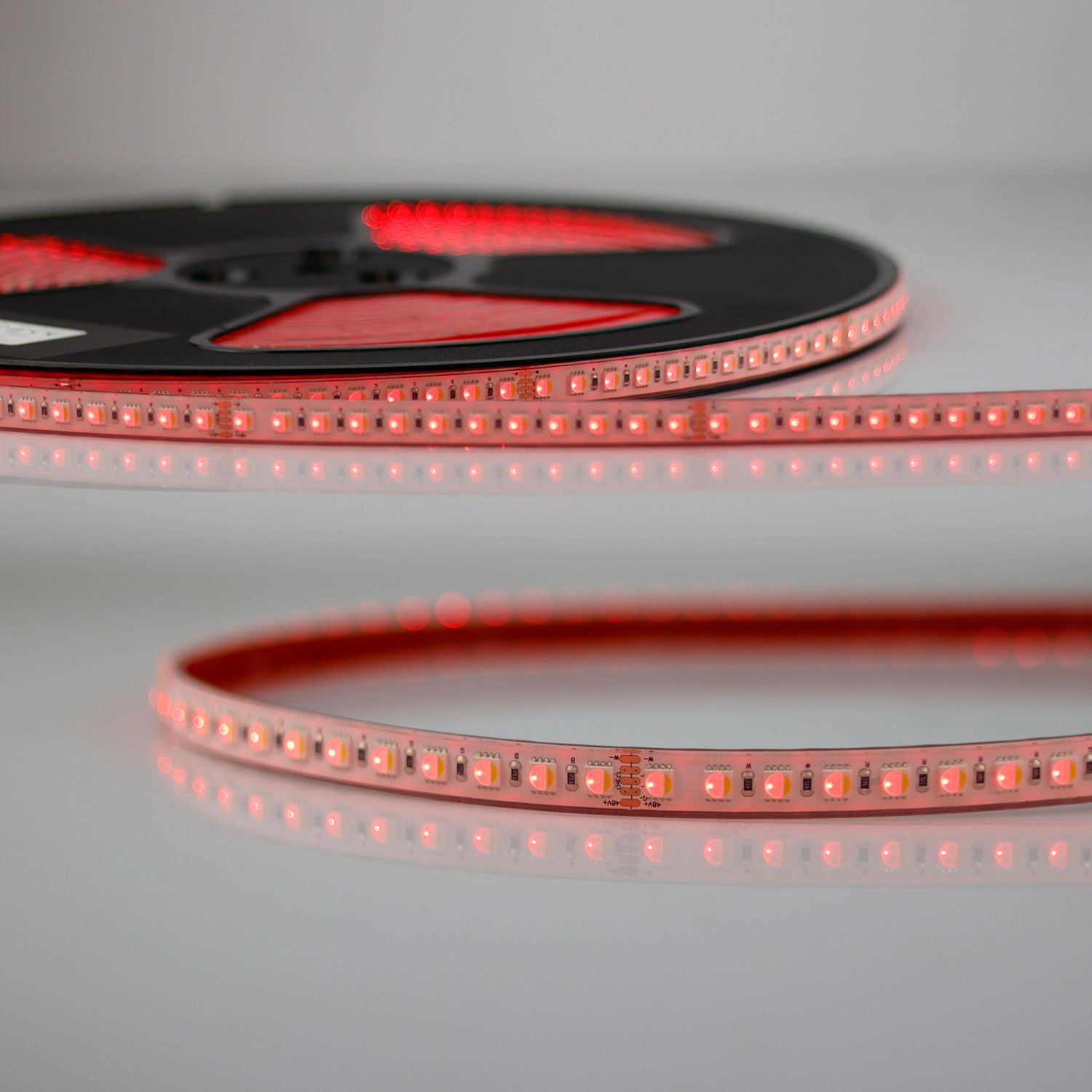 ISOLED LED AQUA RGB+WW Flexband, 48V DC, 19W, IP68, 4in1 Chip, 20m Rolle, 96 LED/m ISOLED LED AQUA RGB+WW Flexband, 48V DC, 19W, IP68, 4in1 Chip, 20m Rolle, 96 LED/m - 1