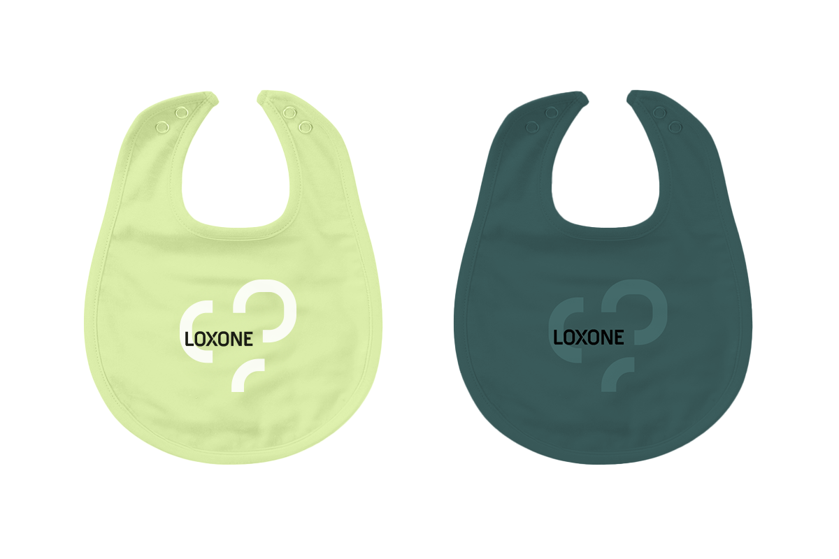 Loxone Baby Lätzchen Set weiß/grün (2 Stk.) Loxone Baby Lätzchen Set weiß/grün (2 Stk.) - 1