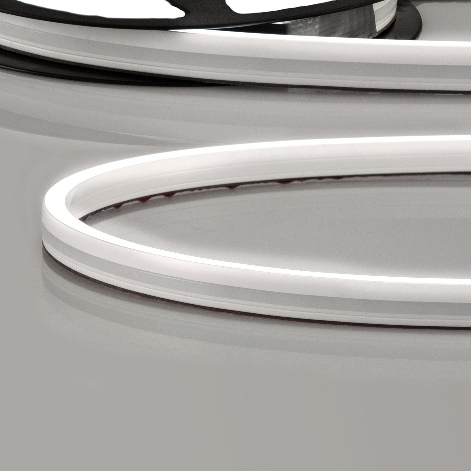 ISOLED LED NEON940 Flexband B08H12, 24V DC, 12W, IP67, 4000K, 5m Rolle, 140 LED/m, inkl. Montageclips ISOLED LED NEON940 Flexband B08H12, 24V DC, 12W, IP67, 4000K, 5m Rolle, 140 LED/m, inkl. Montageclips - 1