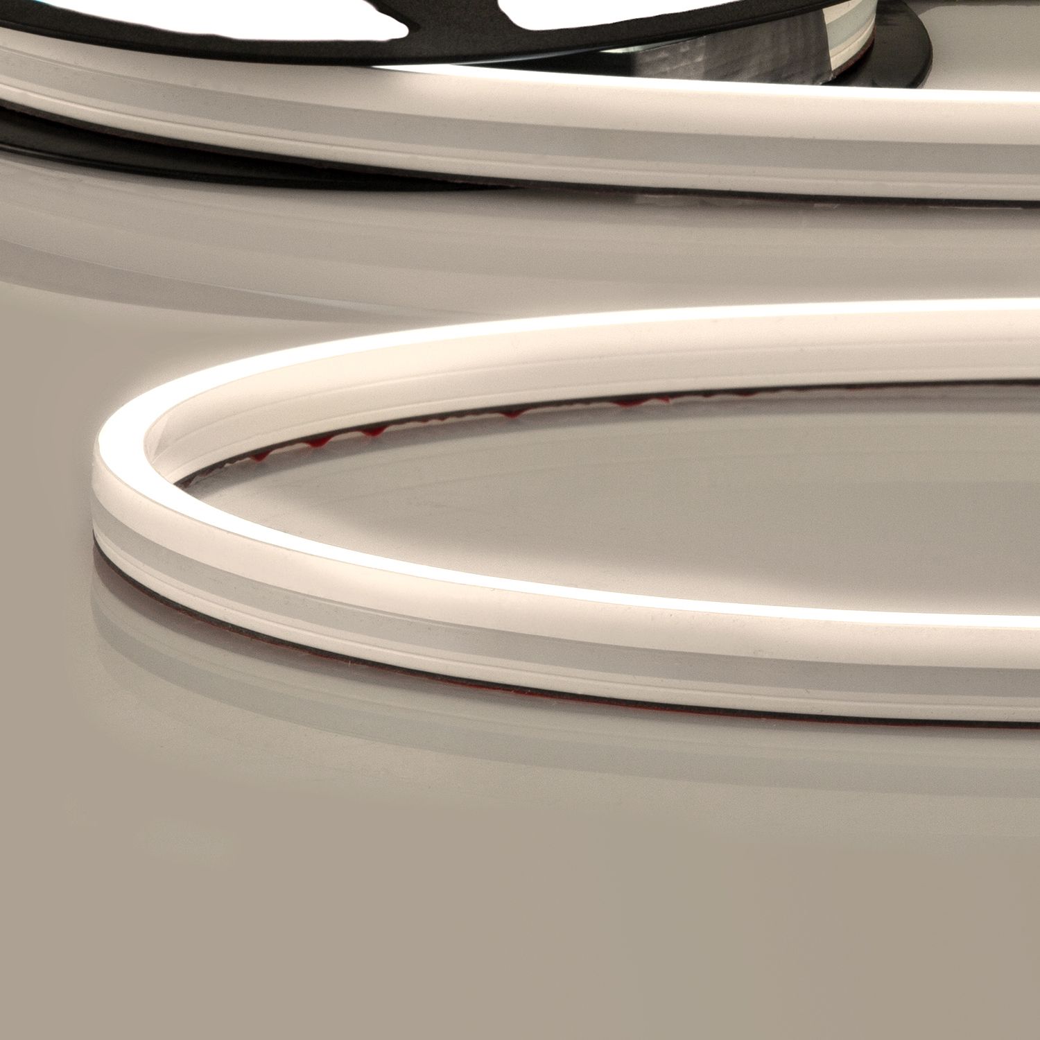ISOLED LED NEON930 Flexband B08H12, 24V DC, 12W, IP67, 3000K, 5m Rolle, 140 LED/m, inkl. Montageclips ISOLED LED NEON930 Flexband B08H12, 24V DC, 12W, IP67, 3000K, 5m Rolle, 140 LED/m, inkl. Montageclips - 1
